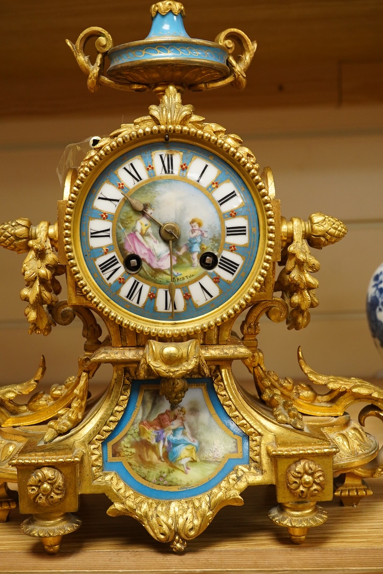 A late 19th century French Sevres style ormolu mantel clock, 31cm